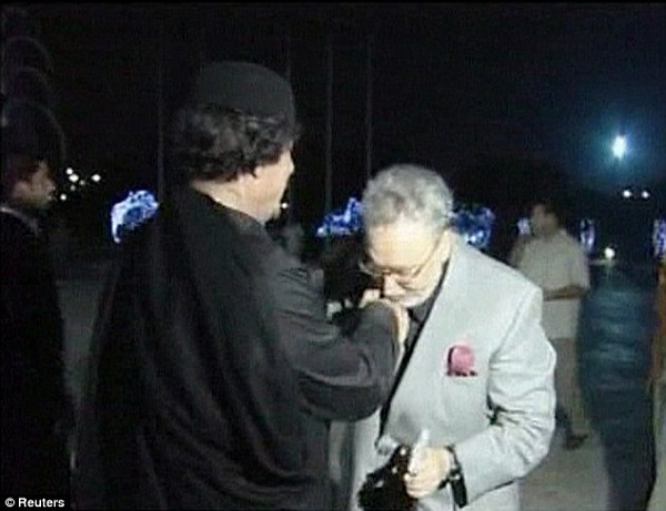 Megrahi kissing the hand of Libya's terrorist-in-chief, al-Gaddafi