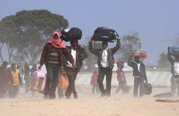 TOPSHOTS Refugees who fled Libya, walk i