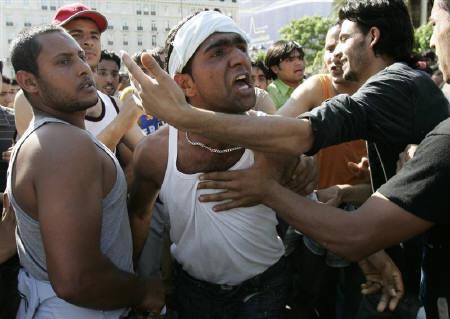 Muslim immigrant shouts slogans during a rally in Athens May 22, 2009.