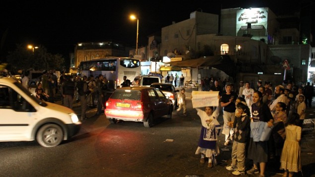 Jewish residents of Ras al-Amoud call for better police protection during a demonstration