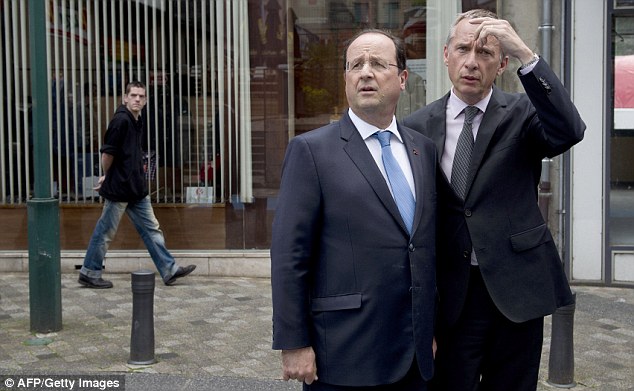 President Francois Hollande doesn't look too happy today