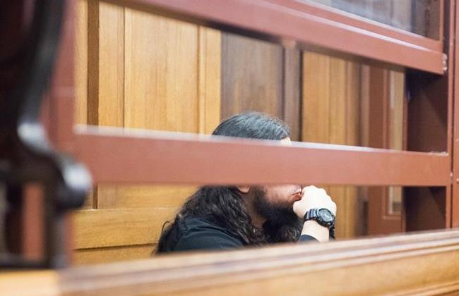 Fatih K, alleged member of the terrorist group Jund al-Sham operating in Syria, sits in the dock of the superior court of Justice in Berlin 