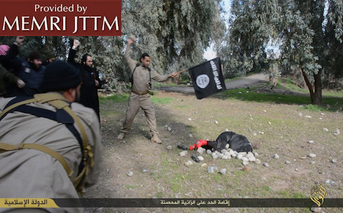 ISIS men stoning the woman to death