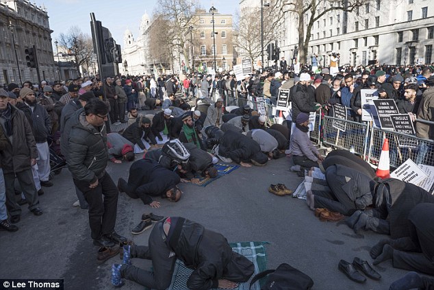 UK Muslims lifting their asses to Allah in the middle of the street