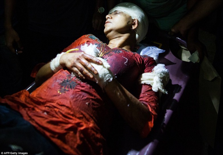 Survivor: Rafida Ahmed is pictured above being stretchered to hospital after the attack  