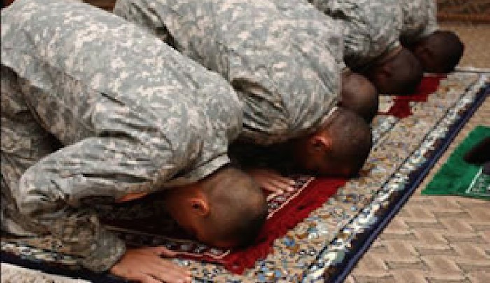 Muslims in the military , asses in the air thanking Allah for the glorious attack in Tennessee 