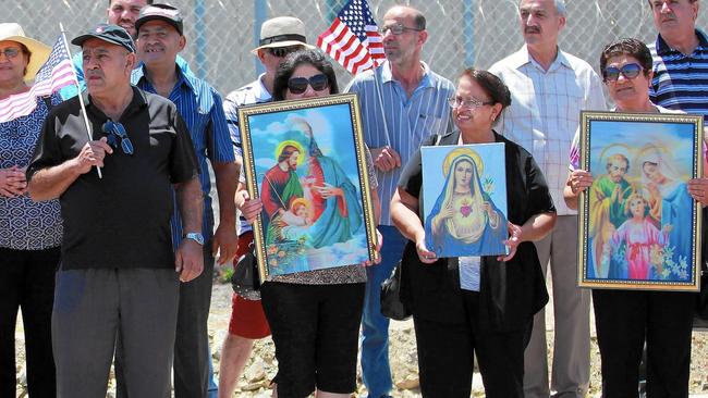 Iraqi Chaldean Christians rally in support of 27 Chaldeans being held at an ICE detention center in California.
