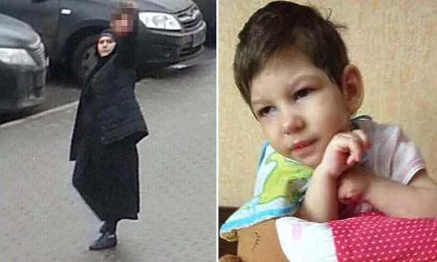38-year-old Gyulchekhra Bobokulova, holding the severed head of the child 